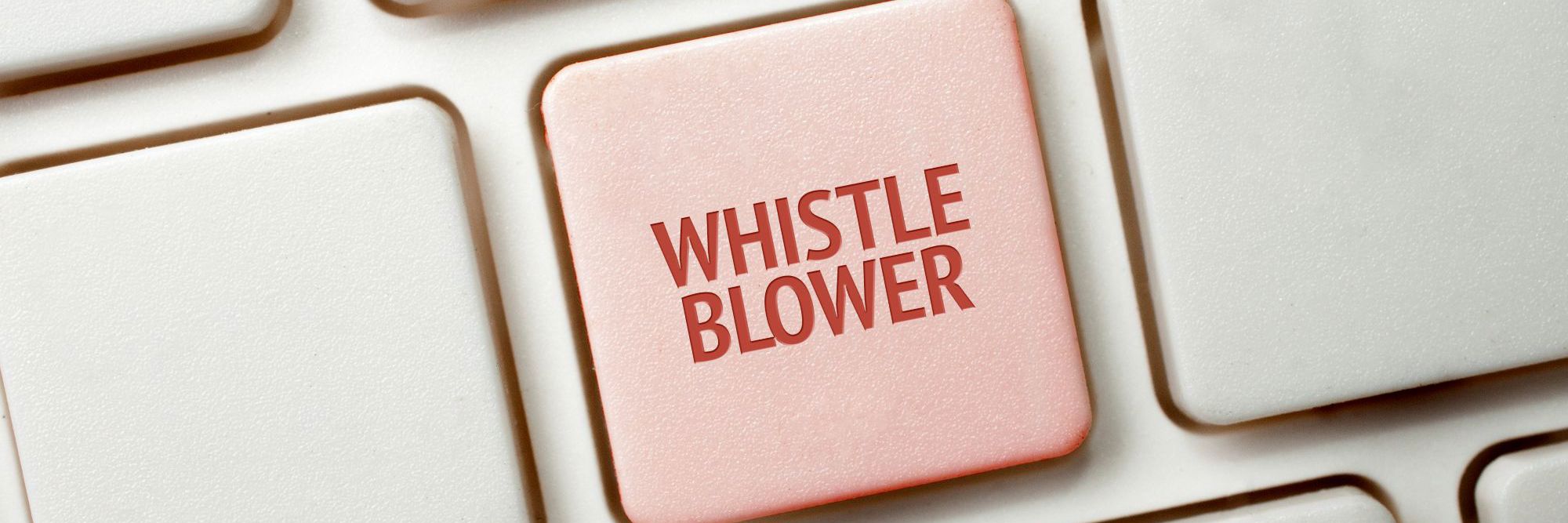En computertast, der står whistleblower på